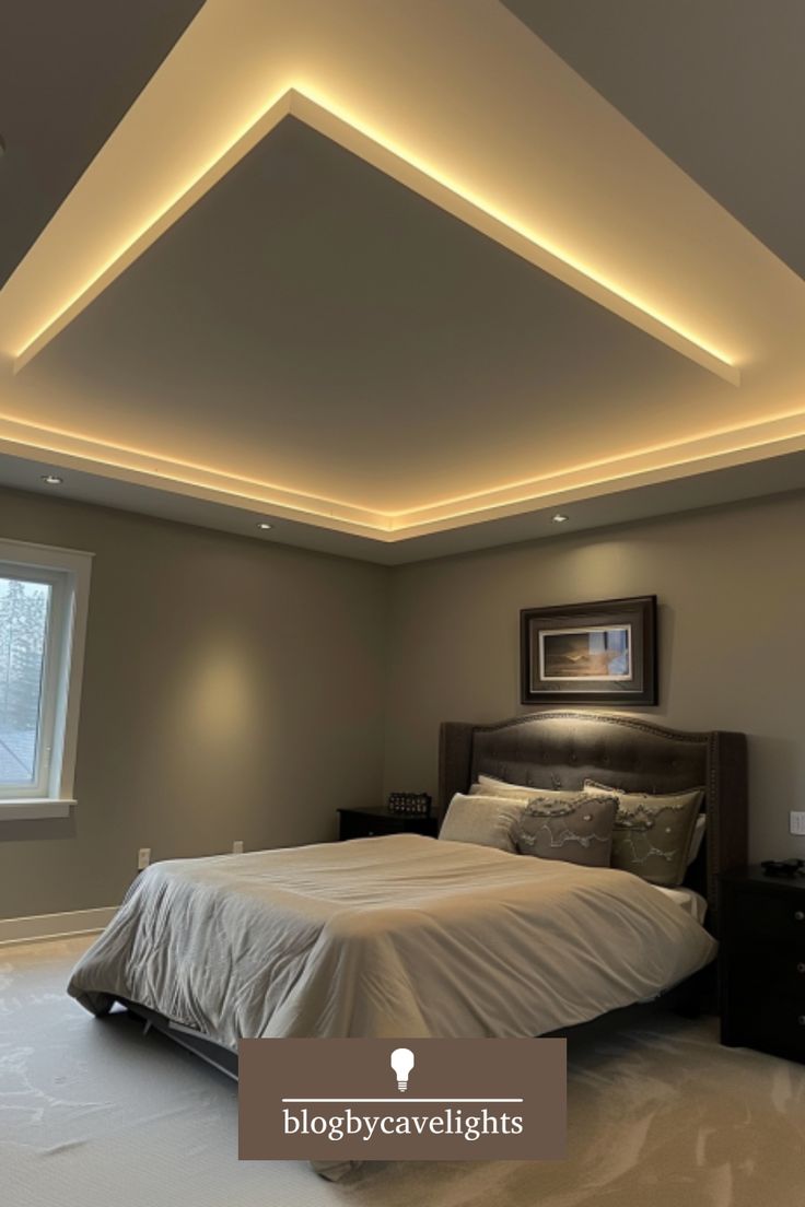 a bedroom with a bed, dresser and window in it's centerpiece is lit up by recessed lighting