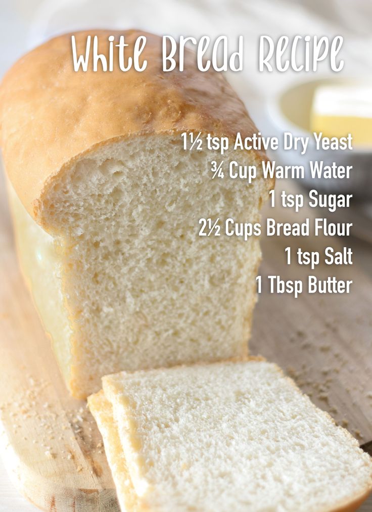 a loaf of white bread sitting on top of a cutting board