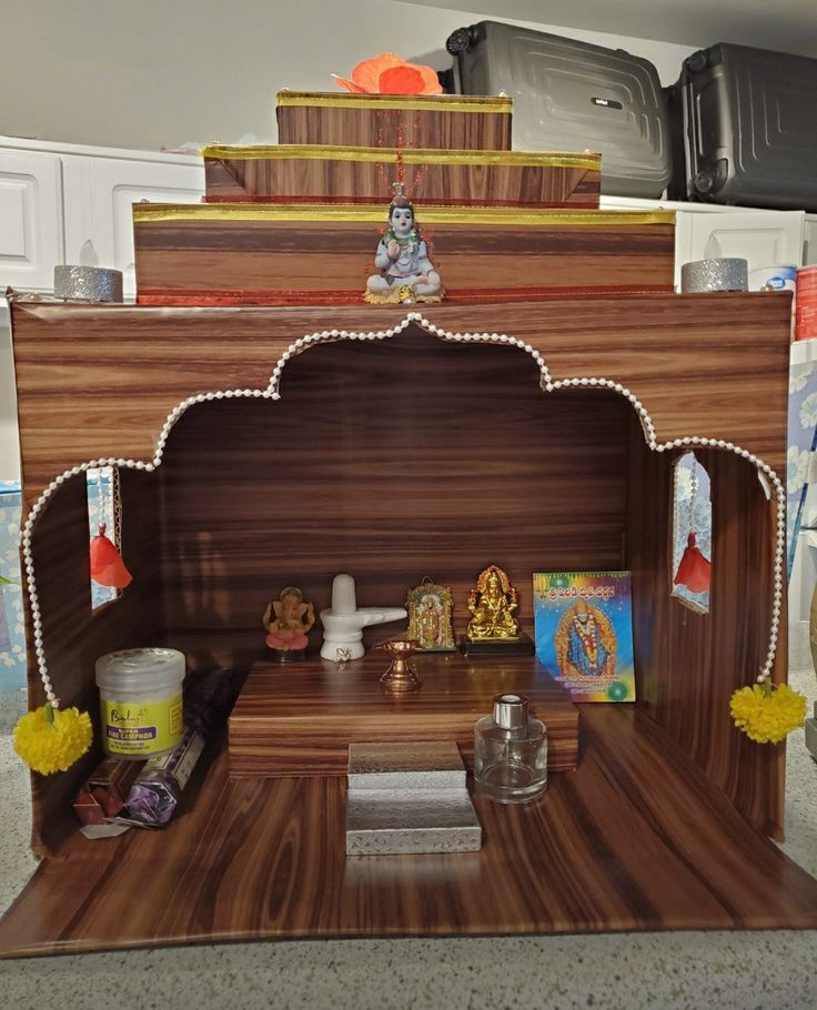 a wooden shrine with decorations on it