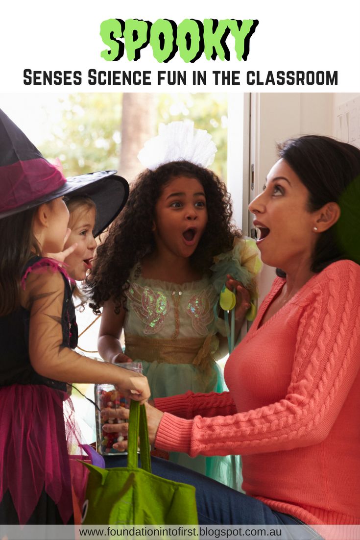 two girls and an adult are talking to each other in front of a window with the words spooky on it