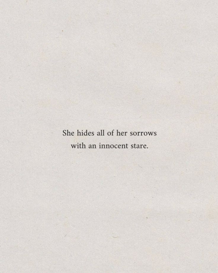 a white piece of paper with the words she hides all her harrows with an innocent stare