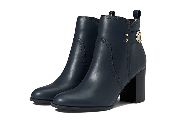 Tommy Hilfiger Daciee - Women's Shoes : Navy : Sleek and elegant, the Tommy Hilfiger Daciee Boots are crafted in a classic style with an almond toe, chunky block heel, and iconic logo hardware on the side. Man-made upper, lining, and insole. Zippered closure with pull loop for easy on and off. Man-made outsole. Imported. Measurements: Heel Height: 3 in Weight: 13.5 oz Shaft: 7 in Product measurements were taken using size 8.5, width M. Please note that measurements may vary by size. Block Heel Boots With Branded Heel Counter For Work, Workwear Boots With Block Heel And Branded Heel Counter, Classic Boots With Padded Block Heel, Classic Spring Boots With Block Heel, Classic Block Heel Boots For Spring, Trendy Workwear Boots With Buckle Closure, Chic Block Heel Boots With Branded Insole, Classic Spring Heeled Boots With Block Heel, Classic Block Heel Work Boots