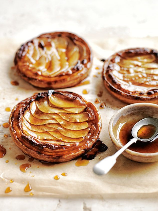 some kind of pastry on a table with syrup