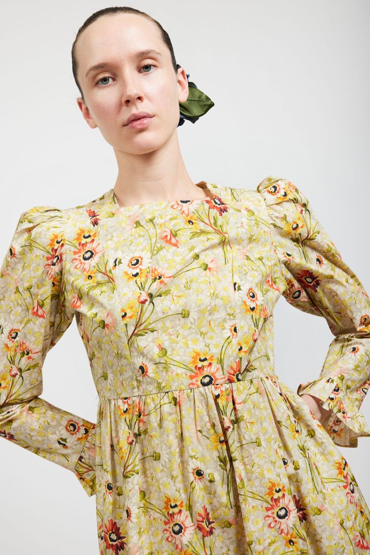 Eligible for Exchange or Store Credit Only. NOTE: This is Sale Item and is non-refundable. Batsheva's classic mini prairie dress with puffed shoulders and ruffles at cuffs in Laura Ashley's archival Witton Floral print. Side-seam pockets. Zip closure at back. Delicate cycle or gentle wash. Hang Dry. Model is wearing size 2 and is 5'10". Fits true to size. Made in India. 100% Cotton. Square Neck Prairie Dress, Summer Floral Print Prairie Dress With Puff Sleeves, Cottagecore Prairie Dress With Ruffles And Square Neck, Batsheva Laura Ashley, Spring Floral Print Prairie Dress, Midi Length, Sandal Platform, Jennifer Fisher, Floral Squares, Prairie Dress