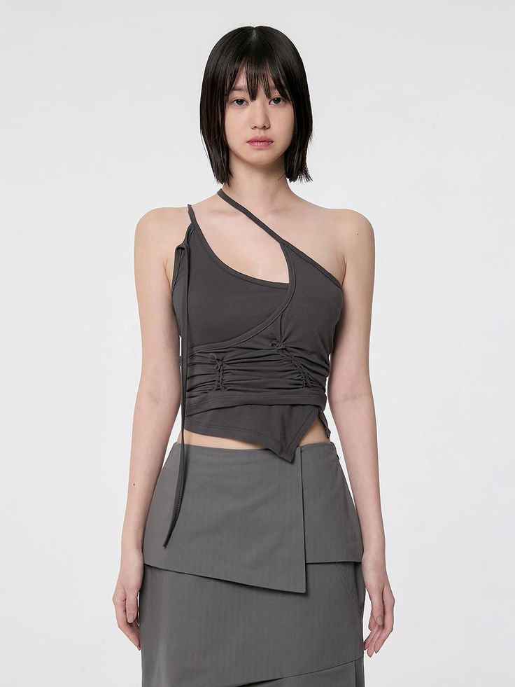 This is a trendy and feminine top set by FLARE UP that is made out of high quality and sturdy material. With distinctive mood of the design and comfortable wear, you can style it for your casual daily outfit.- Inner and outer top layered- Hand braided detail- Soft touch of elastic fabric- Trendy and feminine mood Edgy Gray Tops For Summer, Edgy Gray Summer Tops, Modern Gray Summer Tops, Edgy Fitted Gray Tops, Gray Fitted Edgy Tops, Modern Fitted Gray Tops, Modern Fitted Gray Top, Modern Gray Top For Spring, Fitted Asymmetrical Gray Top