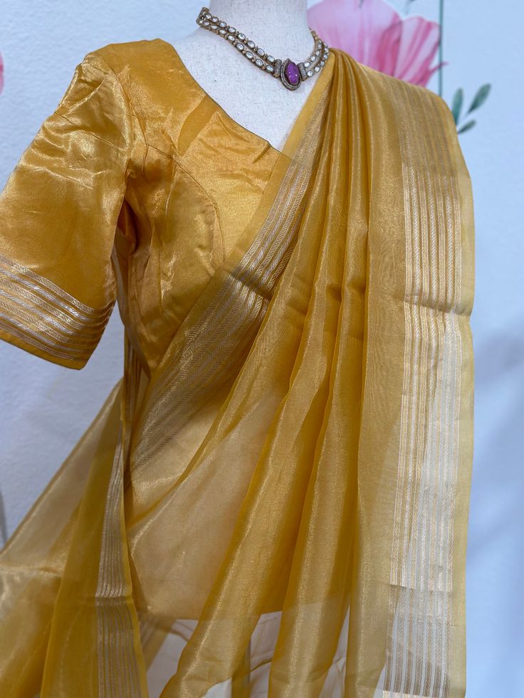 Amazing silk mark certified Banarasi tissue saree blouse size 36-40 fall & pico done. Comes with in-skirt Exclusive sarees from Haas Elegant Slub Silk Blouse With Dupatta, Slub Silk Saree With Sheer Dupatta, Festive Saree With Sheer Dupatta In Slub Silk, Elegant Tussar Silk Blouse With Dupatta, Gold Bollywood Style Pre-draped Cotton Silk Saree, Festive Slub Silk Saree With Sheer Dupatta, Bollywood Style Slub Silk Blouse With Sheer Dupatta, Elegant Cutdana Blouse Piece In Slub Silk, Elegant Slub Silk Blouse Piece With Cutdana