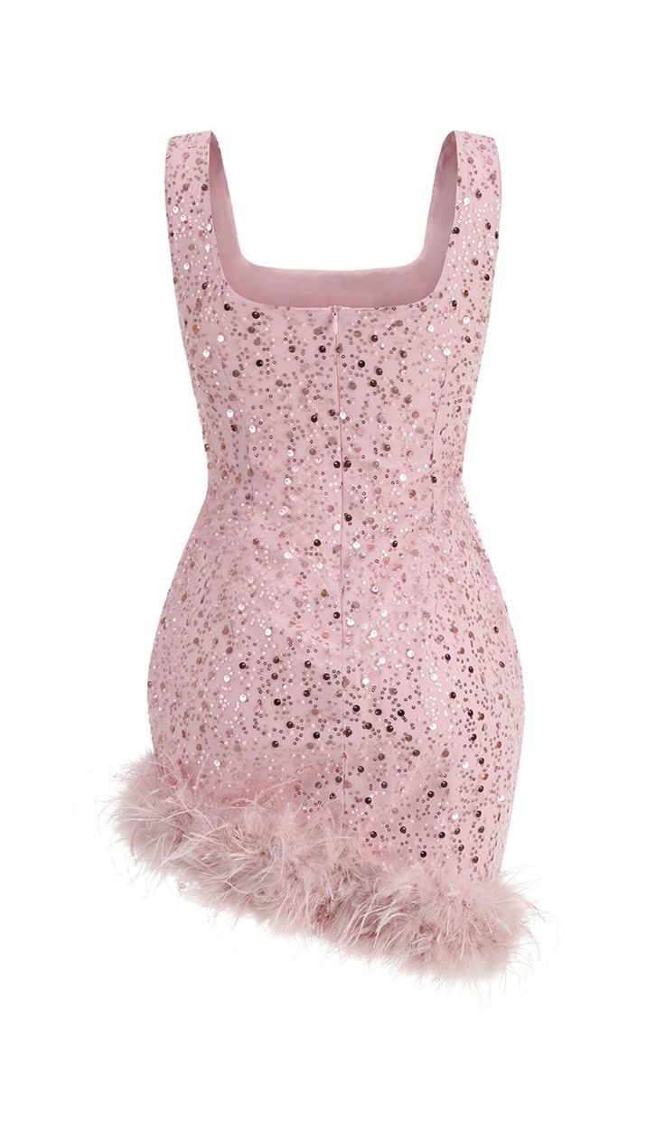 Make a bold and unforgettable statement in this stunning Pink Feather Sequin Dress. This dress is the perfect combination of classic elegance and modern edge, featuring a fitted silhouette that hugs your curves and a red sequin design that catches the light from every angle. The feather trim adds a touch of drama and movement, making this dress a true showstopper. Gentle Dry Clean OnlyColour may vary due to lighting on images. The product images (without model) are closest to the true colour of