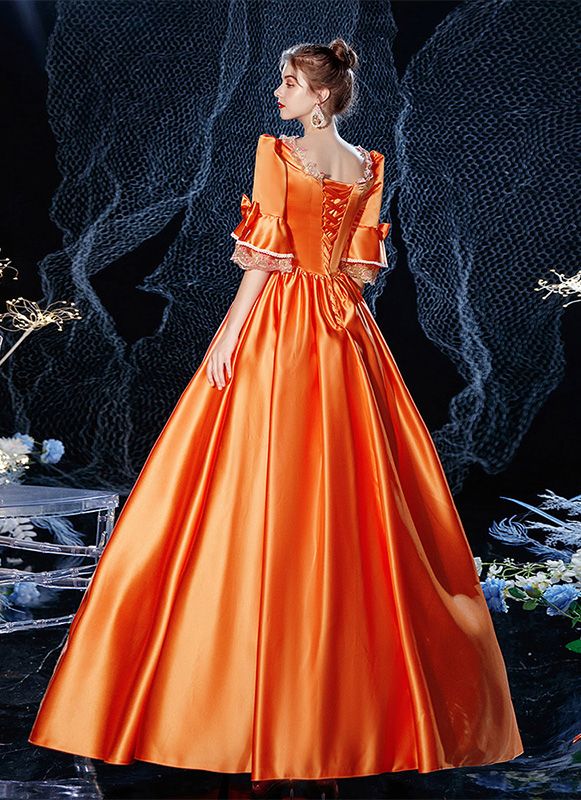 Orange Baroque Rococo Marie Antoinette Dress Vintage Renaissance Reenactment Clothing     Condition: Brand New   Color:  As Picture   Material: Satins And Lace   Silhouette: Ball Gown   Sleeve Length: Half Sleeve   Dresses Length:Floor-Length   Neckline: Square-Collar   Decoration: Lace   Style: Vintage     Includes: Dress Orange Ball Gown, Victorian Rococo Ball Gown With Historical Design, Floor-length Victorian Rococo Dress Costume, Yellow Rococo Dress, Marie Antoinette Dress, 1780s Italian Gown, Masquerade Party Dresses, Marie Antoinette Style Formal Floor-length Dress, Theatre Dress