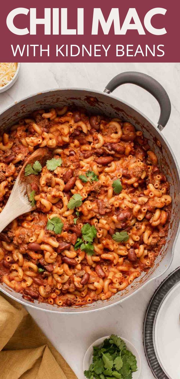 a skillet filled with chili macaroni and beans, topped with cilantro