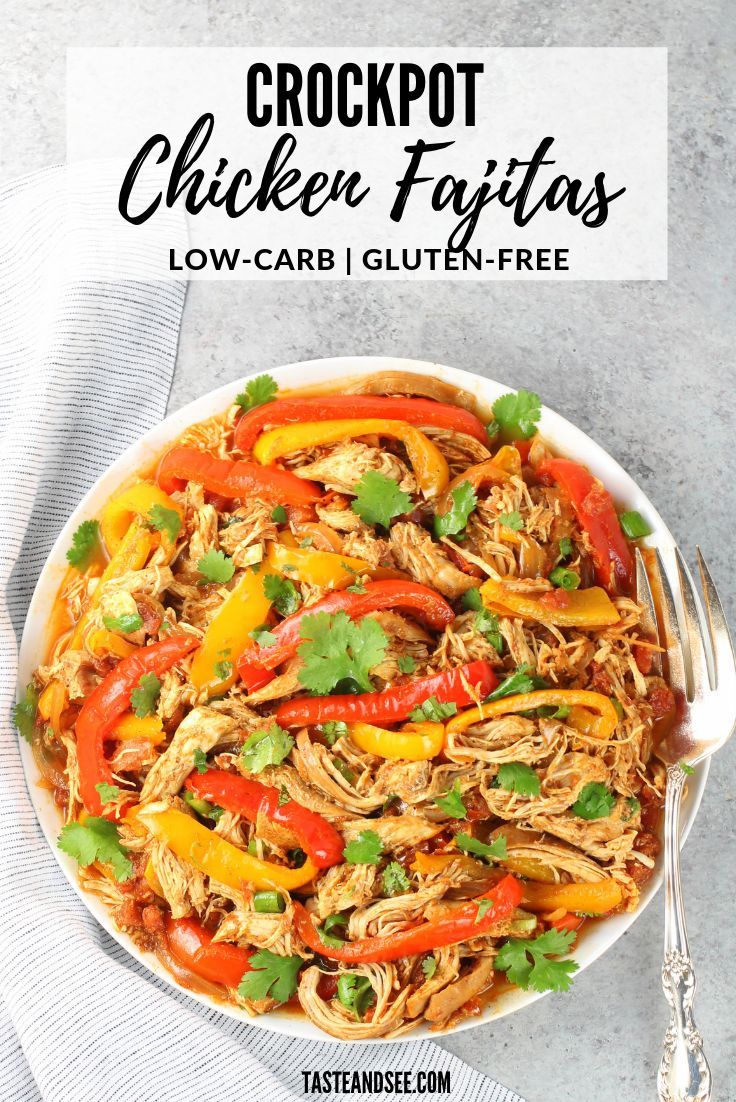 crockpot chicken fajitas in a bowl with cilantro and peppers