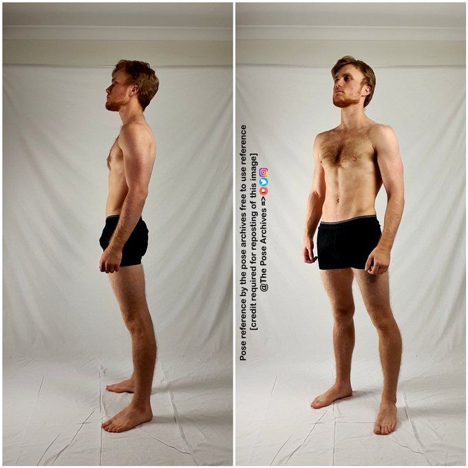 a man without a shirt is standing in front of a white backdrop and wearing black trunks