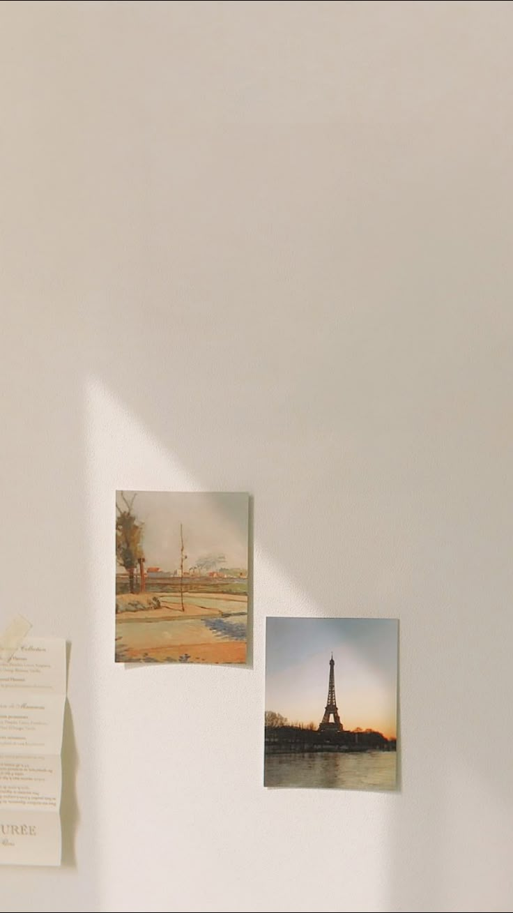 three pictures hanging on the wall next to each other