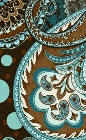 an abstract blue and brown design with dots on it's surface, in the style of paisley