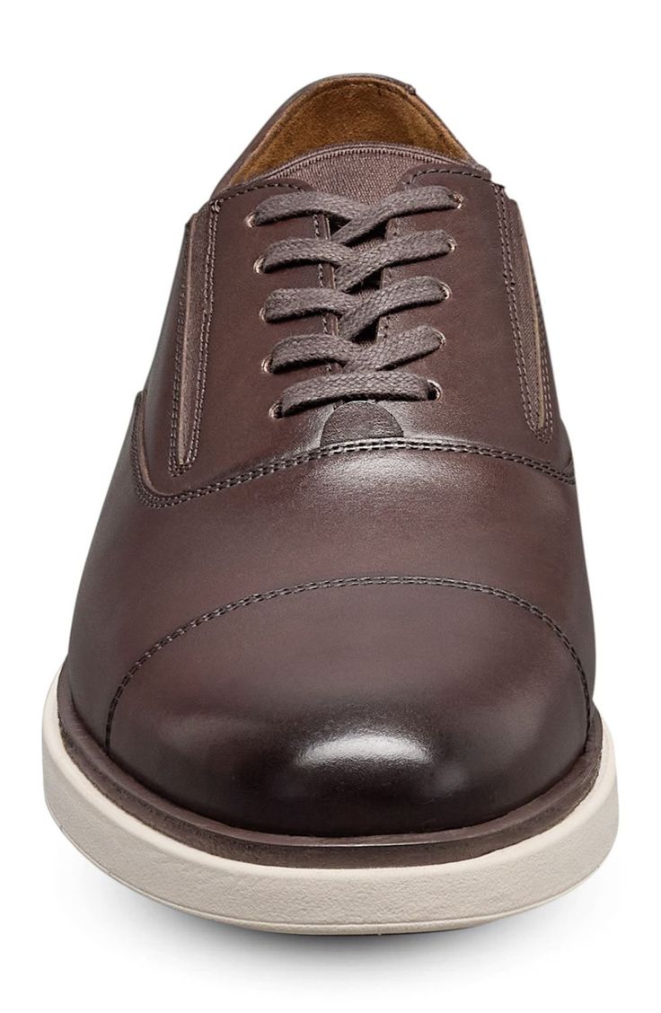 A rich leather upper and streamlined silhouette lend timeless sophistication to a versatile slip-on oxford grounded by a durable rubber sole. Slip-on style with elastic gore insets Removable, cushioned insole with arch support Leather upper and lining/rubber sole Imported Leather-lined Low-top Oxfords For Derby, Brown Slip-on Oxfords With Removable Insole, Slip-on Leather Oxfords For Business Casual, Slip-on Oxfords With Brogue Detailing And Cap Toe, Leather Slip-on Oxfords For Business, Slip-on Oxfords With Leather Footbed For Derby, Classic Sneakers With Leather Footbed For Work, Slip-on Cap Toe Oxfords With Rubber Sole, Leather Footbed Slip-on Oxfords For Derby