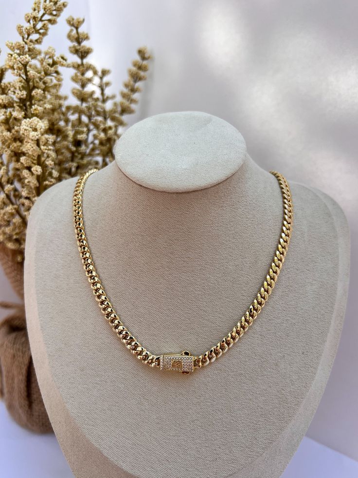 Wearing a cuban chain is a symbol of luxury, wealth, and success. This Necklace is designed to fit comfortably on you and to complete your everyday look. ✨DESCRIPTION✨ METAL: Stainless Steel FINISH: 14k gold plated STONE: Cubic Zirconia  WIDTH: 4mm LENGTH: 16 INCHES AND 18 INCHES  QUALITY: WaterProof, Nickel-free, Hypoallergenic and Tarnish Free COLOR: Gold CLOSURE: BOX ✨JEWELRY CARE QUIDE✨ * Bath with warm soapy water * Keep away from cleaning agents. * Avoid contact with harsh chemicals found Gold Necklace Thick, Gold Chain Women, Dope Jewelry Accessories, Cuban Necklace, Baby Necklace, Mexican Jewelry, Elegant Baby, Dope Jewelry, Fancy Jewelry