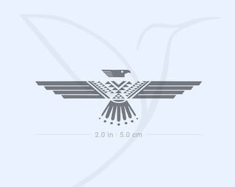 an eagle logo with the words 20 in 50cm on it's back side