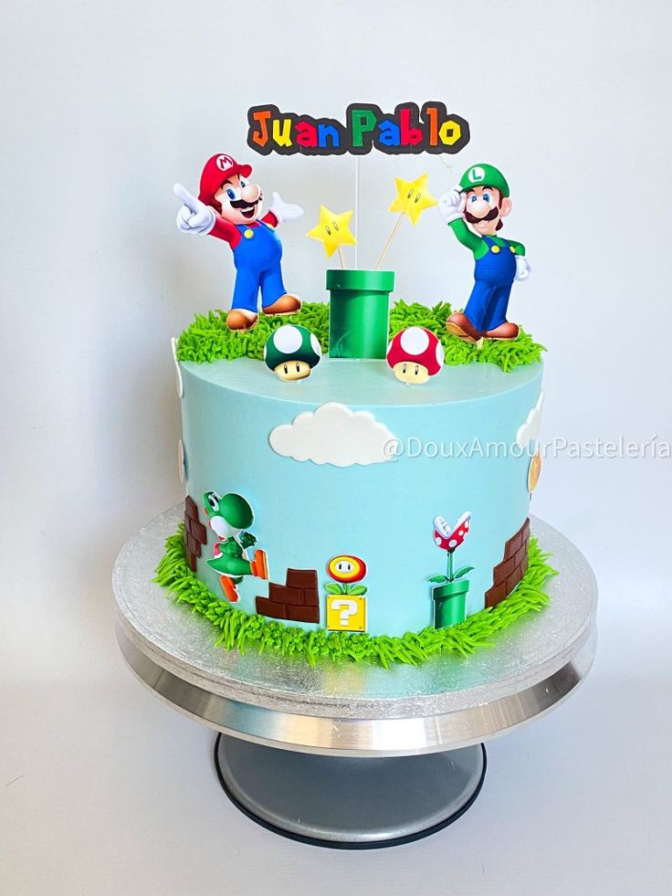 a birthday cake with mario and luigi on top