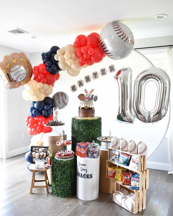 a baseball themed birthday party with balloons and decorations