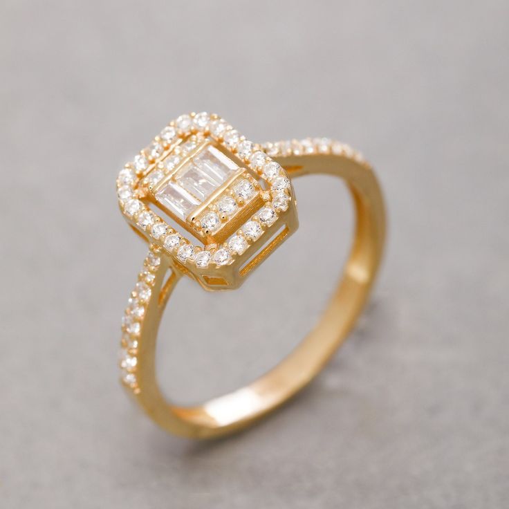 ★14K Solid Gold Baguette Ring, 925 Sterling Silver Baguette Ring, Emerald Cut Stone Ring, Elegant Ring, Valentine's Day Gift, Christmas Gift★ ▷ MATERIAL ★ All of our 10K, 14K, 18K Jewelry are Solid Gold. ( Not Gold Filled or Gold Plated ) ★ All of our silver jewelry is 925 sterling silver and 14 carat gold plated. (Our white silver jewelry is rhodium plated.) ▷ PRODUCTION AND PACKAGING ★ Our jewelry is handmade. It is specially prepared for you in the dimensions you want upon order. ★ We work wi Gift Rings With Baguette Diamonds In Rectangular Shape, Gift Rectangular Rings With Baguette Diamonds, Cubic Zirconia Baguette Rings For Gifts, Baguette Cut Cluster Ring Fine Jewelry Gift, Fine Jewelry Baguette Cut Cluster Ring As Gift, Fine Jewelry Baguette Cut Cluster Ring, Baguette Cut Cluster Ring Fine Jewelry, Gold Baguette Ring As Gift, Baguette Rings For Gift