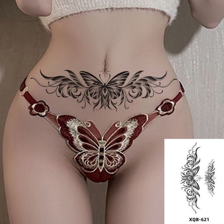 an image of a woman with tattoos on her stomach and butterfly tattoo on the side