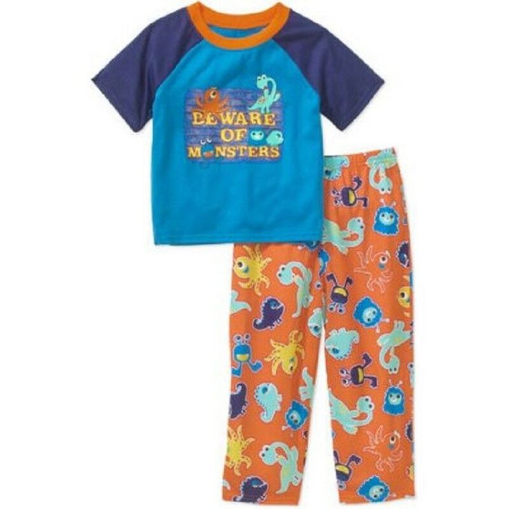 Keep your little one comfortable from day to night in this toddler boys' two-piece sleepwear set from Peas & Carrots. A short-sleeve tee and a matching pair of pajama pants are included in the set. The T-shirt has a stylish graphic on the front and a tag-free inner for a smooth feel on his skin, while the pants have a colorful pattern printed all over and a hassle-free covered elastic waistband. This toddlers' pajama set is great for sleeping and lounging around the house. Peas & Carrots Toddler Multicolor Cotton Sleepwear With Cartoon Print, Playful Printed Cotton Sleepwear, Cute Multicolor Cotton Sleepwear, Casual Cotton Sleepover Sets, Casual Cotton Sets For Sleepovers, Playful Cotton Sleepwear For Bedtime, Multicolor Cotton Sleepwear For Sleepovers, Casual Cotton Bedtime Sets, Casual Cartoon Print Sleep Sets