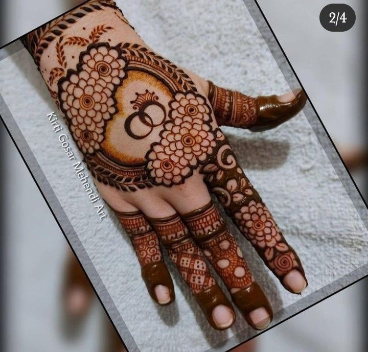 a henna design on the palm of someone's hand