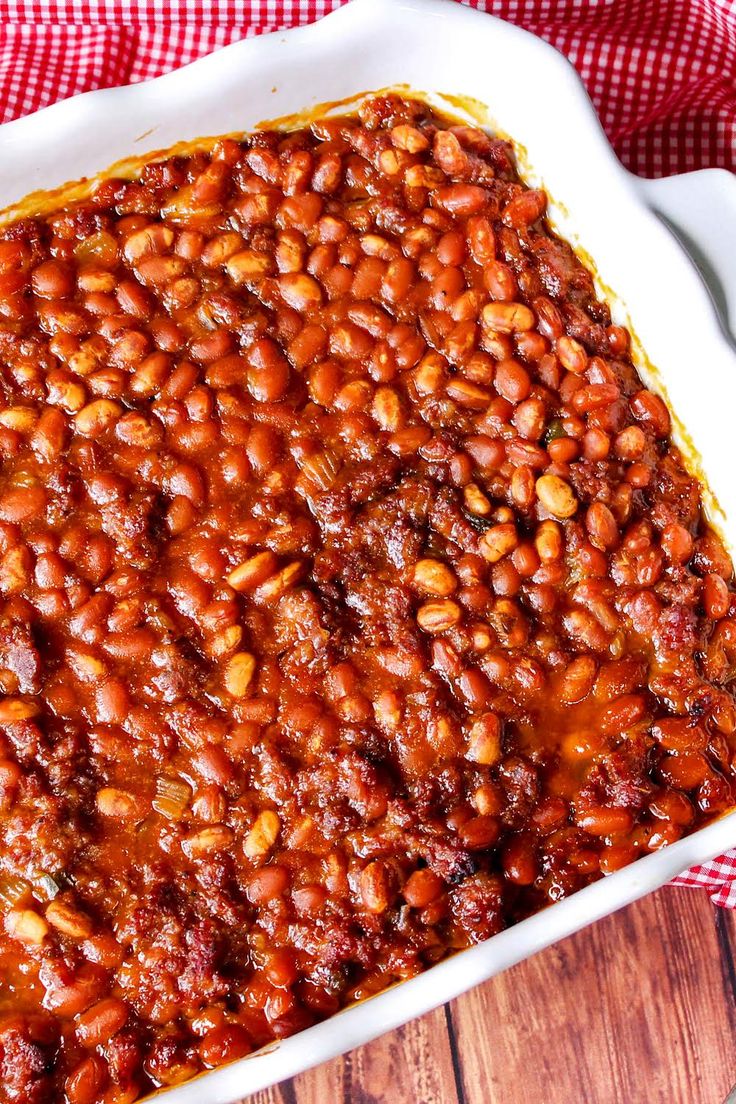 a casserole dish filled with baked beans