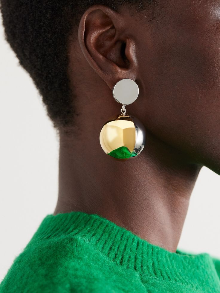 Rabanne's clip earrings are completely hollowed out, so they're quite comfortable despite the generous size. They've been crafted in Italy from silver and gold-tone metal and have mirrored discs at each post.