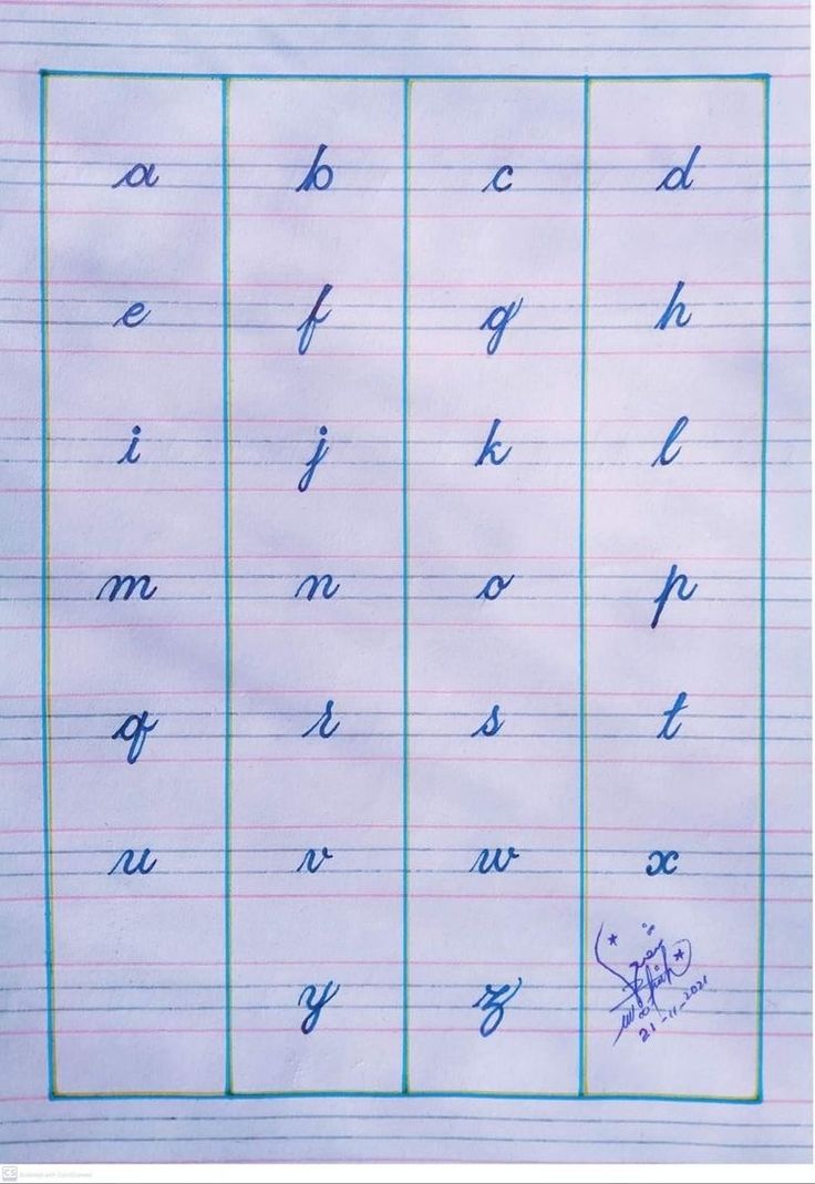 a sheet of lined paper with cursive writing on the bottom and upper letters