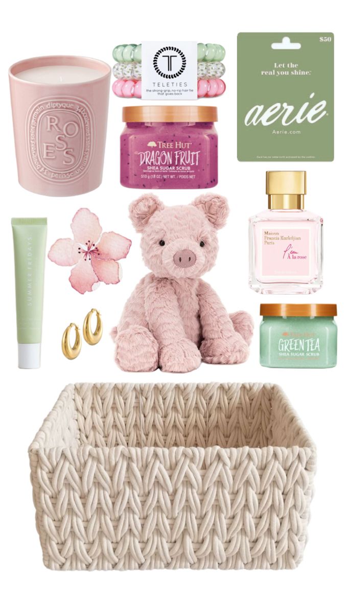 a pink teddy bear sitting on top of a basket next to cosmetics and other items