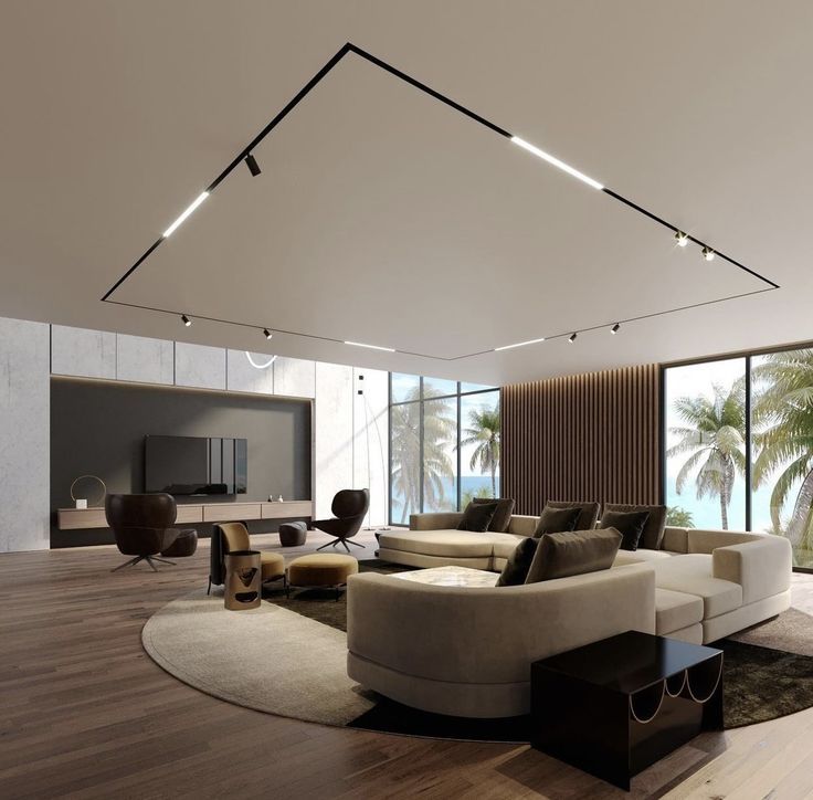 a modern living room with wood floors and large windows looking out onto the ocean at palm trees