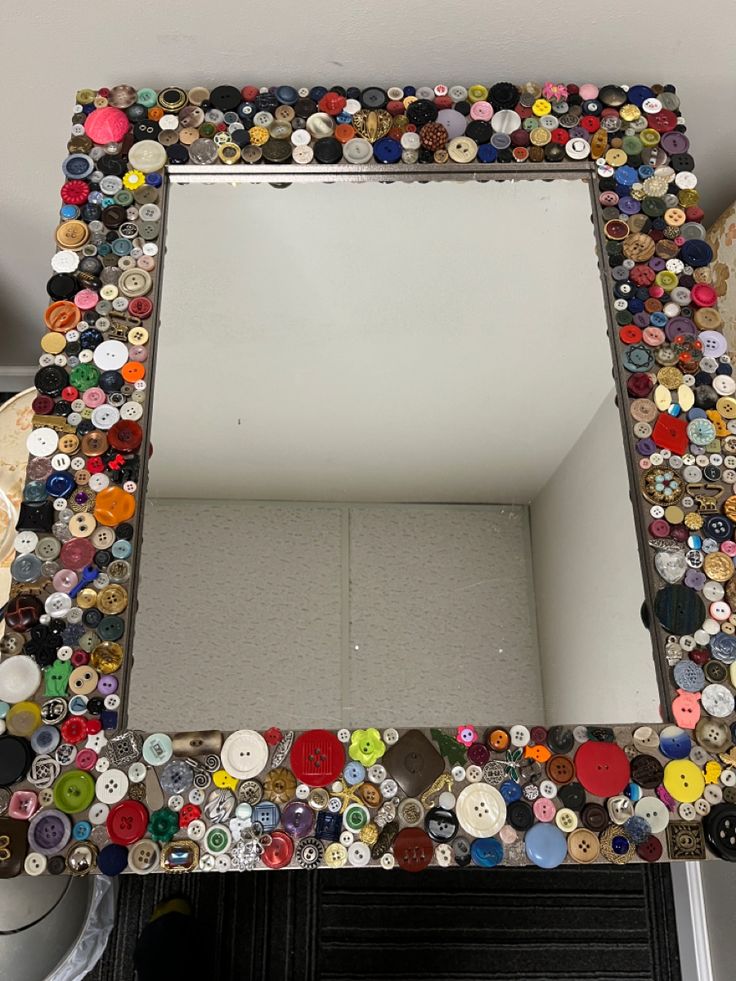 a mirror that has buttons all over it