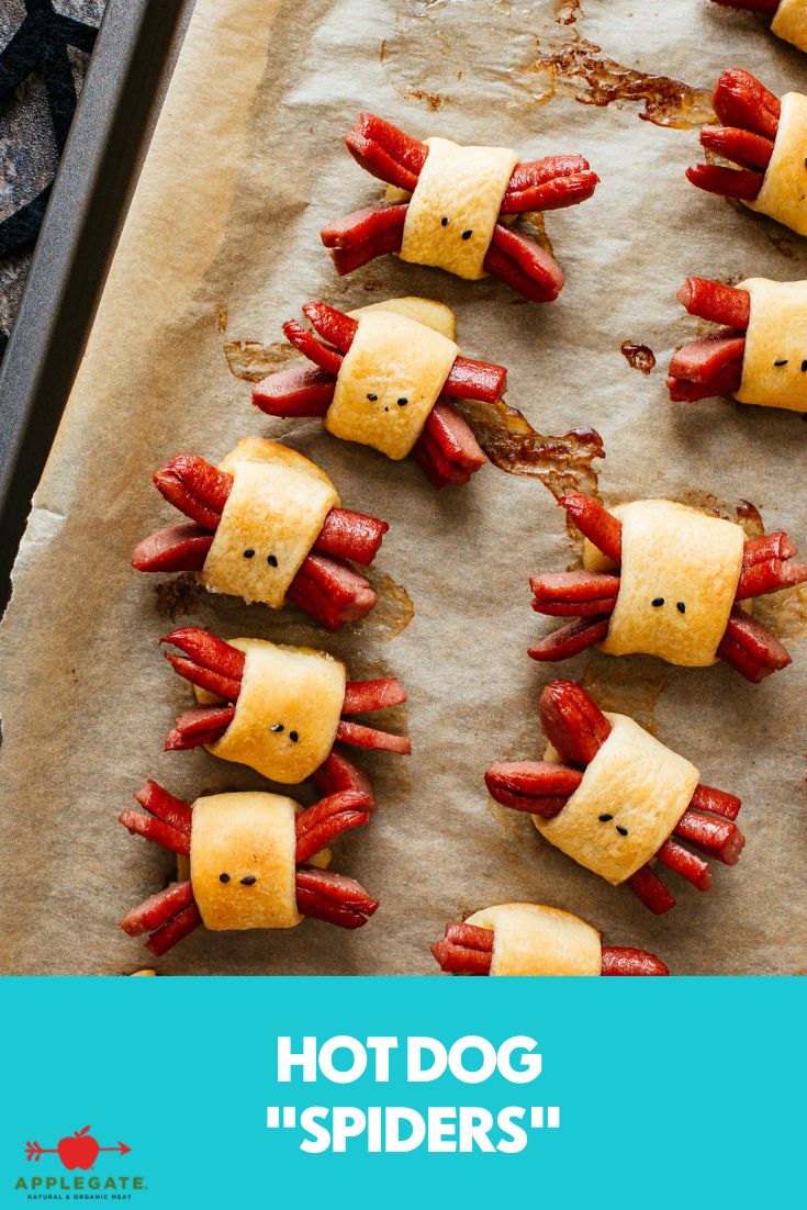 hot dog spider bites are made with cheese and strawberries