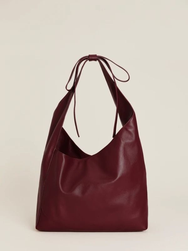 Best of Bags | Sustainable Bags | Reformation Red Hobo Bag, Slouchy Leather Tote, College Tote Bag, Uni Bag, Burgundy Bag, Slouchy Tote, Soft Leather Handbags, Red Tote Bag, Sustainable Bag