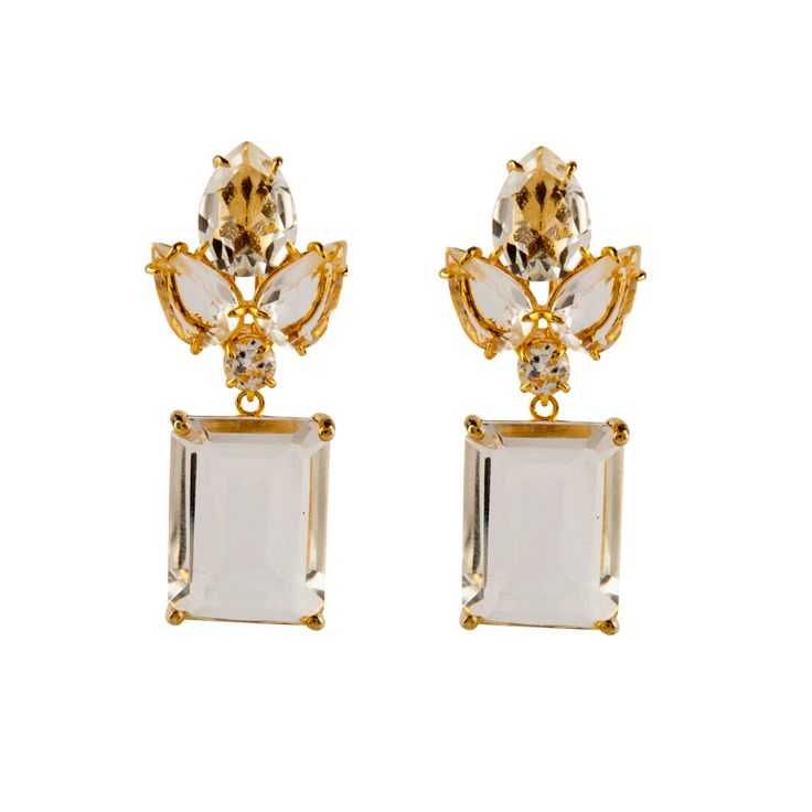 Introducing our Prague Earrings, a remarkable pair designed to bring a touch of vintage and art deco elegance to your look. These earrings feature an innovative and interchangeable setting that allows you to effortlessly remove the drops and change styles, offering a wide range of options to suit your mood and occasion. One of the standout features of the Luz Earrings is their lightweight design, making them perfect for brides looking to add a touch of glamour to their wedding day ensemble. Classic Drop Earrings For Evening, Classic Evening Drop Earrings, Timeless White Earrings For Evening, Modern Elegant Earrings For Evening, Timeless Gemstone Earrings For Formal Occasions, Luxury Teardrop Crystal Earrings For Formal Occasions, Timeless Evening Earrings With 17 Jewels, Elegant Drop Earrings For Gala, Timeless Gemstone Earrings For Evening