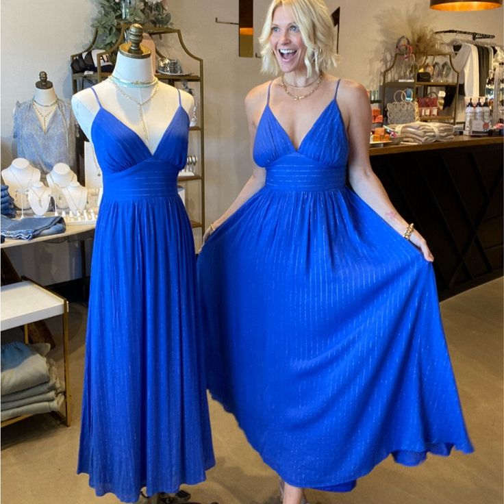 Our Cobalt Blue With Gold Thread Maxi Dress Features Cami Top, Waist Yoke, Full Skirt, Smocked Back Waist Band With Tie Detail Details Self : 100% Rayon Lining : 100% Polyester Size & Fit - Model Is 5`8" And Wearing Size Small - Measurements Taken From Size Small - Approx. Length: 51.5" Blue Lined Maxi Dress For Brunch, Lined Blue Maxi Dress For Brunch, Royal Blue Pleated Summer Dress, Blue Ruched Maxi Dress For Summer, Blue Ruched Summer Maxi Dress, Blue Sundress Maxi Dress For Parties, Blue Pleated Dress For Brunch, Blue A-line Maxi Dress For Date Night, Blue Ruched Sundress Maxi Dress