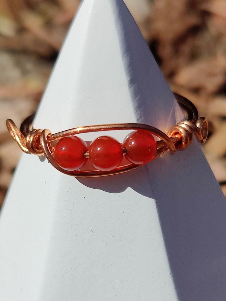 This gorgeous hand made carnelian wire wrapped ring is a size 9.5. Wire Wrapped Ring, Wire Wrapped Rings, Wrap Rings, Wire Wrapped, Wire Wrapping, Hand Made, Jewelry Rings, Ships, Craft Supplies