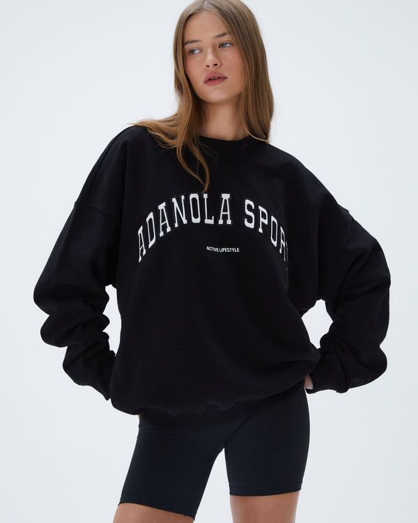 Collegiate Oversized Tops For Loungewear, Sporty Drop Shoulder Sweats For Fall, Oversized Sportswear Sweatshirt For Fall, Oversized Fall Sportswear Sweatshirt, Sporty Boxy Fit Sweatshirt For Fall, Oversized Sporty Crew Neck Sweatshirt, Urban Oversized Sweats For Fall, Trendy Oversized Sports Tops, Sporty Oversized Drop Shoulder Sweatshirt