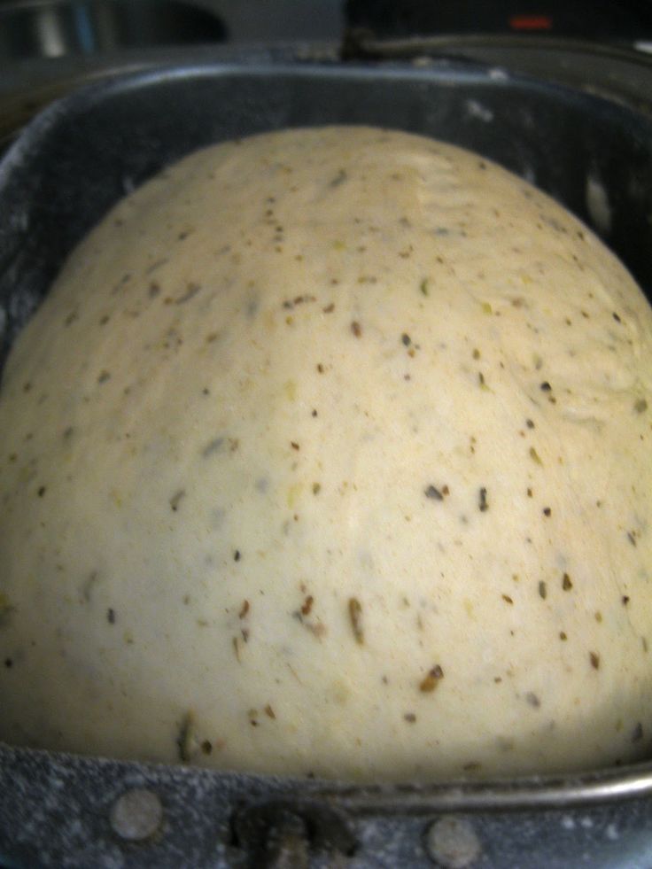 an uncooked dough in a metal pan