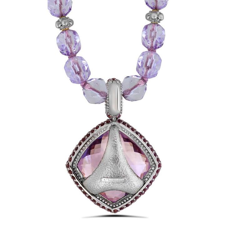 The Royal Collection is inspired by an intricate mosaic of the royal palaces around the world. From exotic Marrakesh and colorful Barcelona, to the magical islands of Greece, it reminds us that we’re all descendants of kings. Handmade in NYC. One of a kind. Price includes 18-inch strand of amethyst beads. For additional wearability and pricing options, please refer to pendant and bead options or contact us. One of a kind. Enhancer dimensions: 41 mm L by 29 mm W. Metal: 18 karat white gold. Rose Luxury Purple Diamond Necklace, Luxury Amethyst Pendant Jewelry, Elegant Square Pendant Necklace With Faceted Detail, Luxury Gemstone Square Pendant Jewelry, Fine Jewelry Amethyst With Diamond Cut, Luxury Amethyst Necklace With Diamond Accents, Fine Jewelry With Diamond-cut Amethyst, Luxury Amethyst Pendant Necklace, Luxury Amethyst Necklace With Gemstone Accents