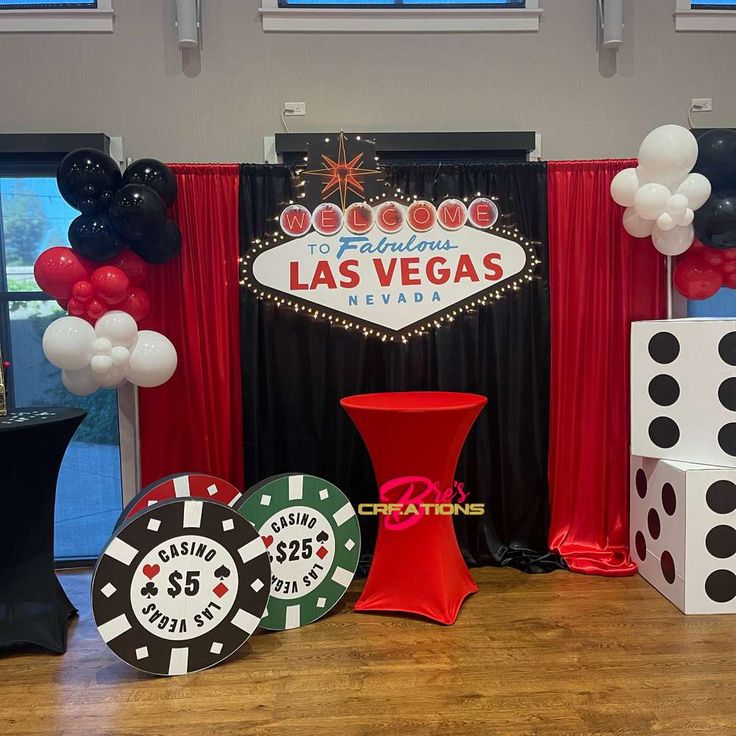 a casino themed party with balloons and dices