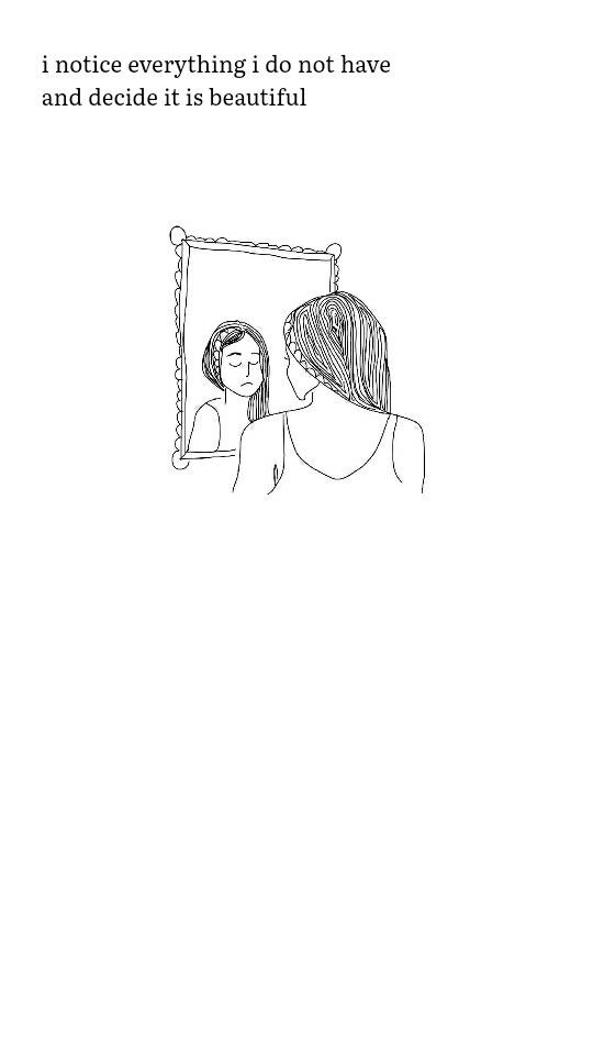 a woman looking at her reflection in the mirror while another person is brushing their hair