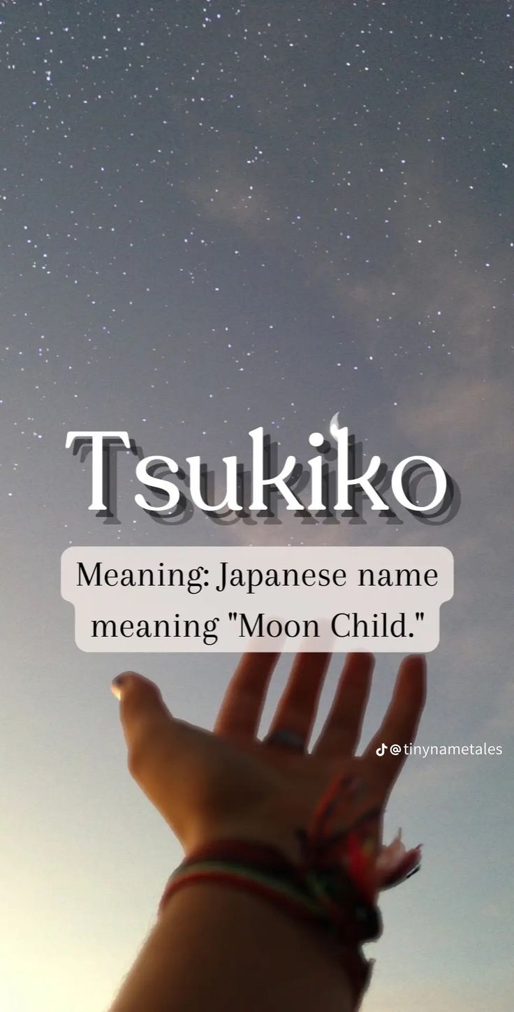 someone holding their hand up to the sky with stars in the background and text reading tsukiko meaning japanese name meaning moon child