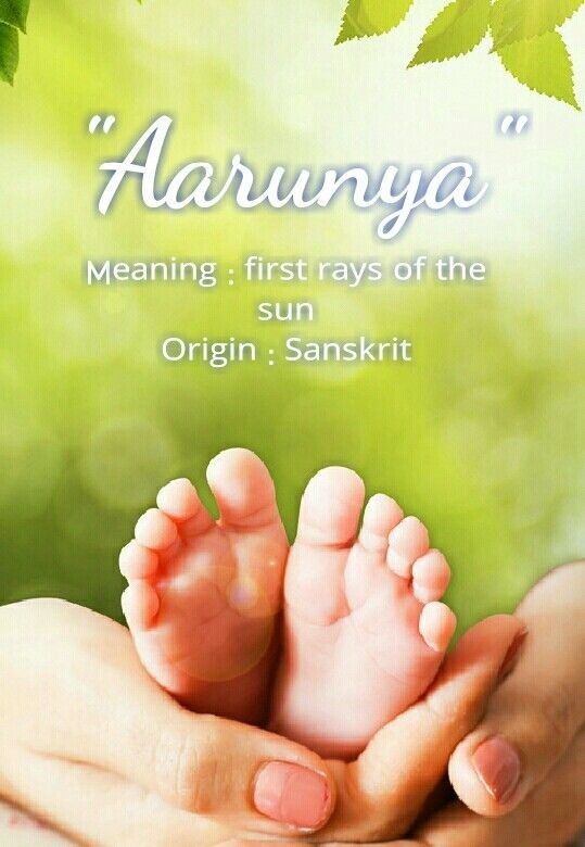 a person holding a baby's foot in their hands with the caption, aarumya meaning first rays of the sun origin sankrit