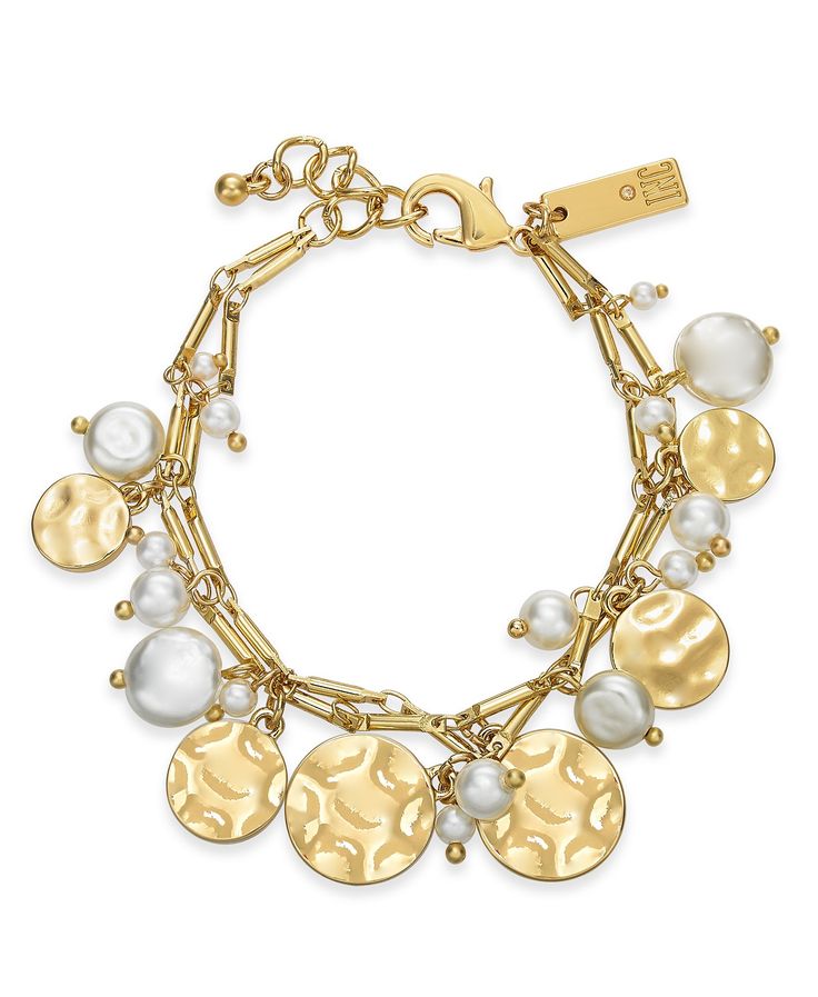 <p>Shake up your look with this chic imitation pearl and hammered disc charm bracelet from INC International Concepts®.</p>

<ul class="">
 	<li>Set in gold-tone mixed metal</li>
 	<li>Approx. length: 7" + 1" extender</li>
 	<li>Lobster clasp closure</li>
</ul> Luxury Yellow Gold Cuff Bracelet With Oyster Clasp, Gold-tone Jewelry With Oyster Bracelet In Gold Plated, Yellow Gold-plated Bracelet With Pearl Charm, Gold-plated Yellow Gold Bracelets With Pearl Charm, Adjustable Gold-plated Bracelets With Pearl Charm, Flexible Bracelet, Gold Sign, Beauty Gift Sets, Inc International Concepts