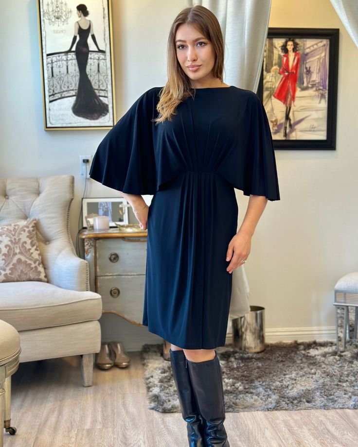 Meet our Joseph Ribkoff Flutter Sleeve Dress that effortlessly flows in all the right places, creating a silhouette that's both flattering and chic! ✨  Elevate your style game by pairing it with a classic or edgy belt for that extra touch of flair. Versatility at its best, this dress is ready to take you from day to night. ☀️ 🌙 Fitted Dress With Butterfly Sleeves For Parties, Chic Flutter Sleeve Dress For Night Out, Fitted Party Dress With Butterfly Sleeves, Elegant Bell Sleeve Formal Dress, Flowy Cape Sleeves Evening Dress, Elegant Ruched Dress With Ruffle Sleeves, Flowy Formal Dress With Cape Sleeves, Flowy Evening Dress With Cape Sleeves, Black Cape Sleeve Dresses For Spring