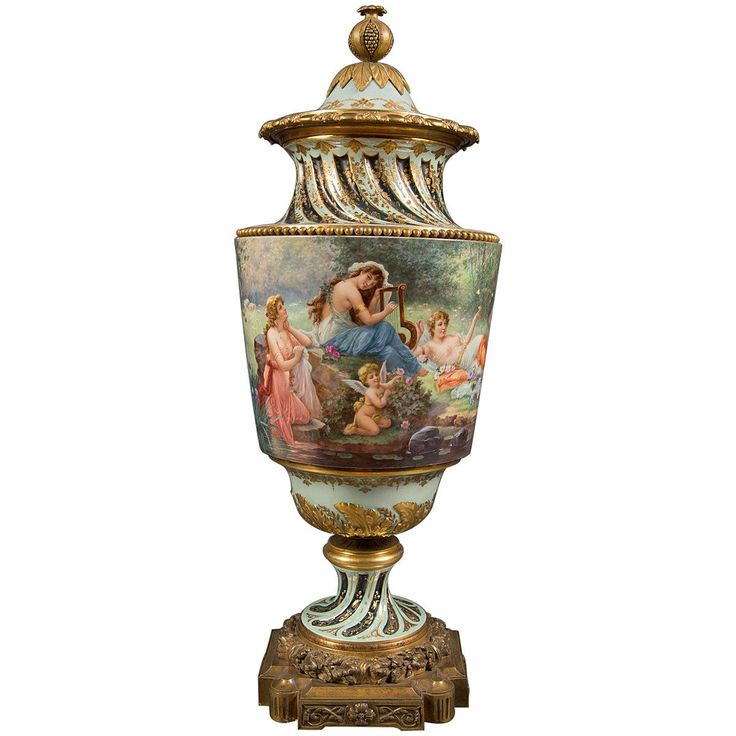 an ornate vase with paintings on it