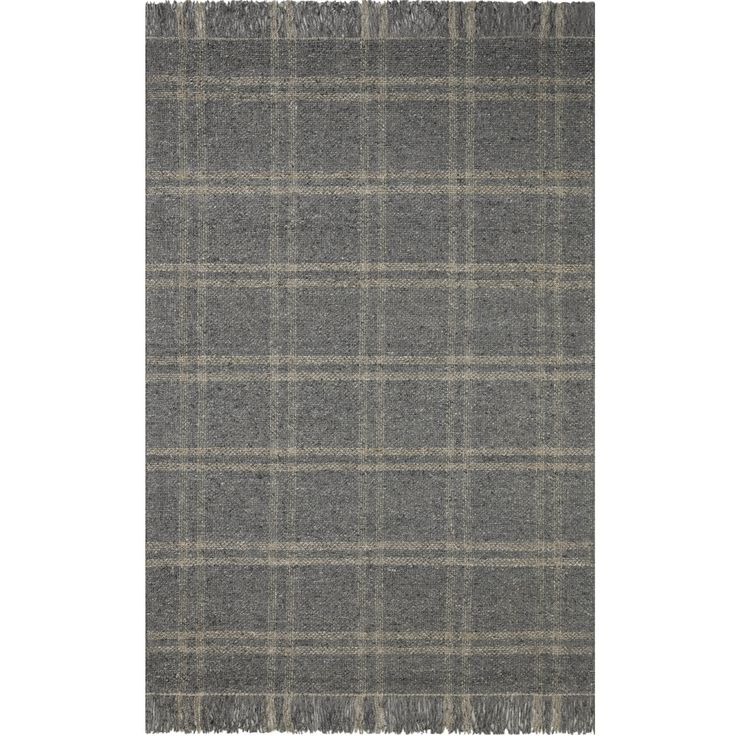 a gray and black plaid rug with fringes