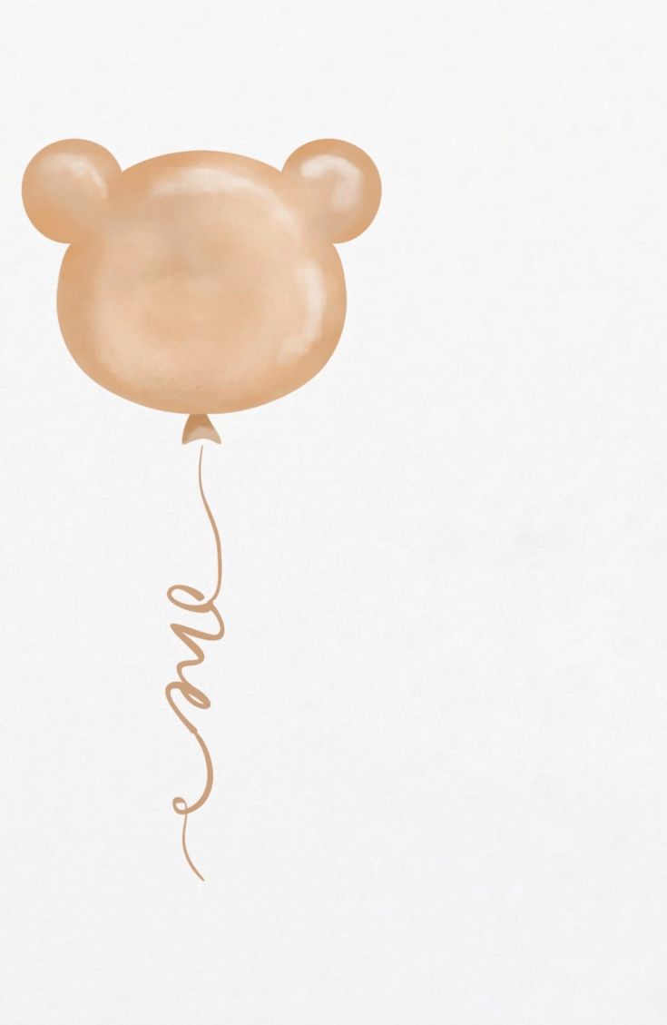 a balloon shaped like a teddy bear with the word love on it's tail