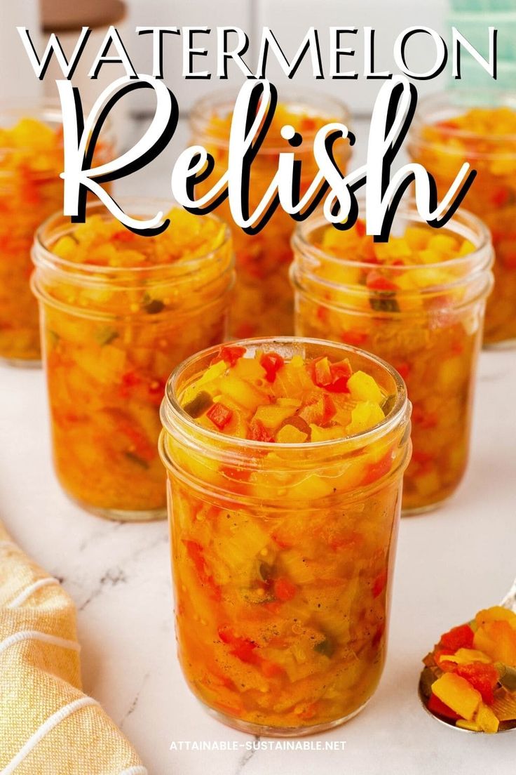 several jars filled with food sitting on top of a table